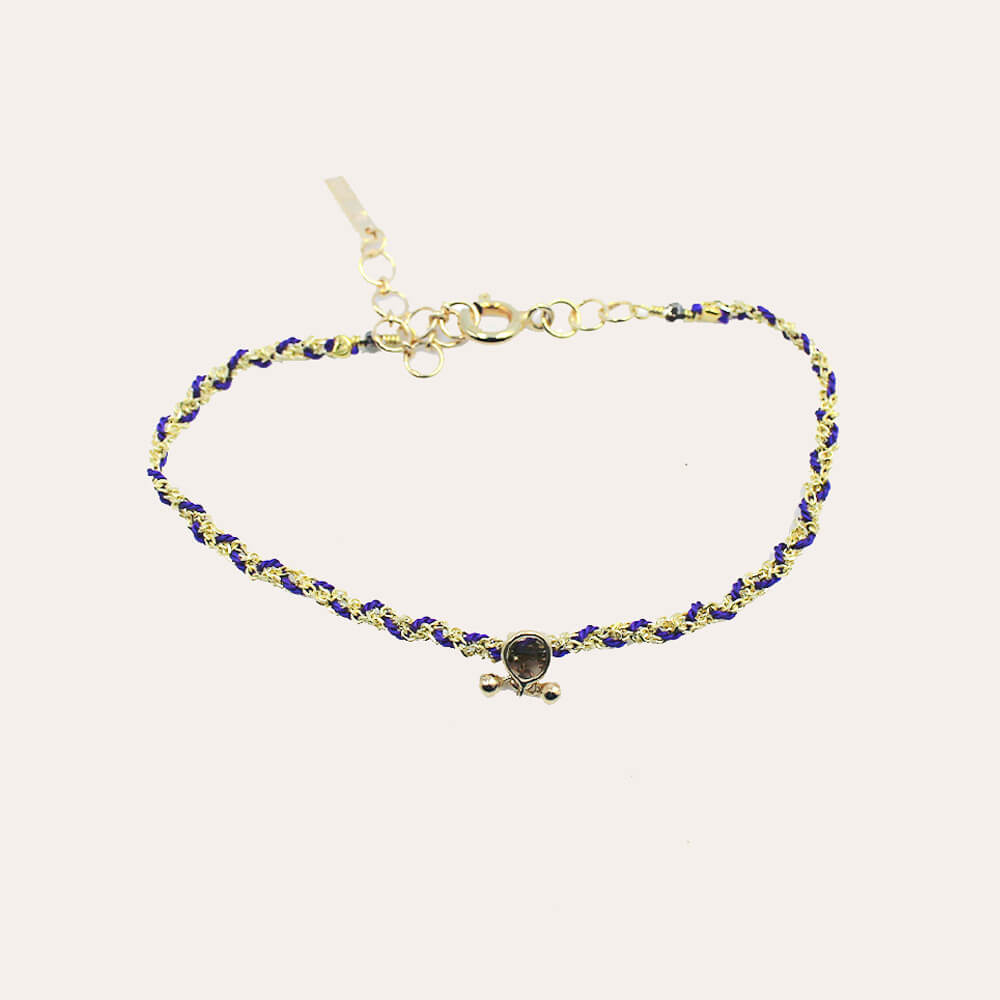 Pulsera fina trenzada con hilo violeta y ametista